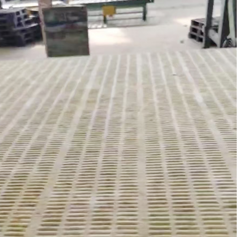 What are the specific requirements for ambient temperature and weather during the construction of rock wool board?