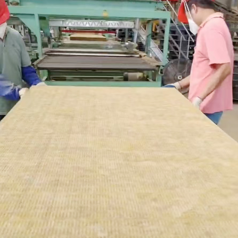 What specific impact does the anchoring depth of anchor bolts have on the overall stability during the construction of rock wool board?